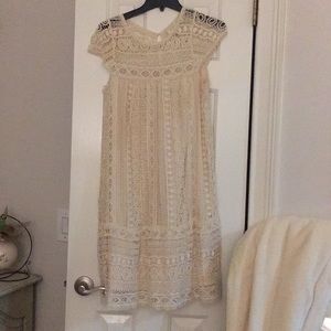 Cream lace dress.